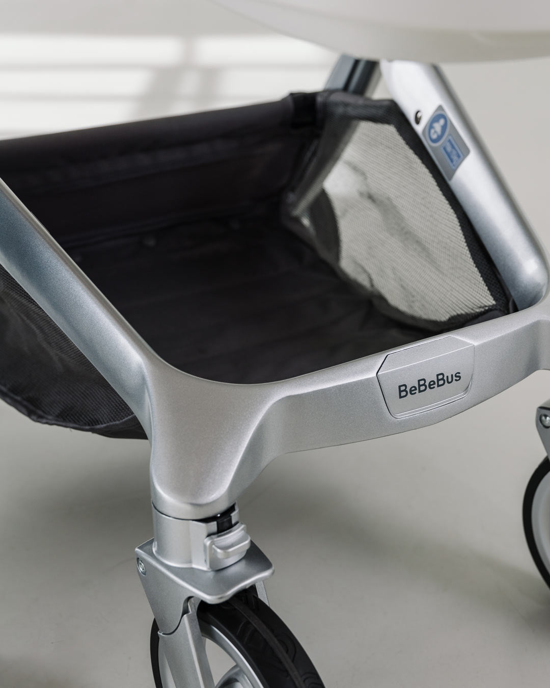Spacious under-seat basket on the BeBeBus Art+ PRO Stroller for baby essentials, ideal for travel system convenience and day-to-day parenting.