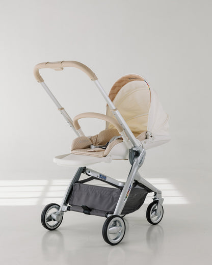Sleek profile of the BeBeBus Art+ PRO luxury baby stroller in lie flat mode, featuring lightweight design and durable wheels for urban strolling.