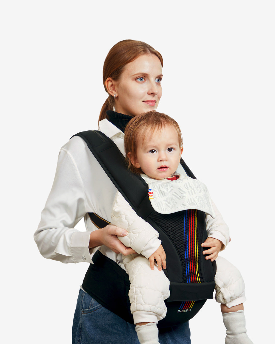 Woman carrying a baby in a black baby carrier with colorful accents on a white background